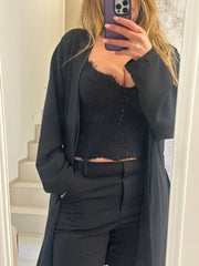 Top in pizzo con bottoni